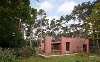 Red Concrete Pool House in the Middle of A Garden-Forest