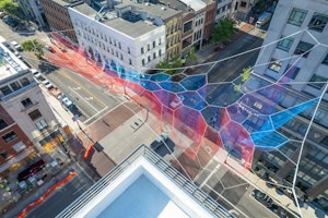 Janet Echelman's "Fiber Aurora" Stretches Over Buildings in Columbus