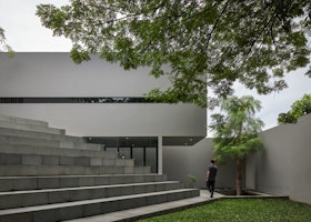 Residence 57: Modern Minimalist Haven with Amphitheater Stairs